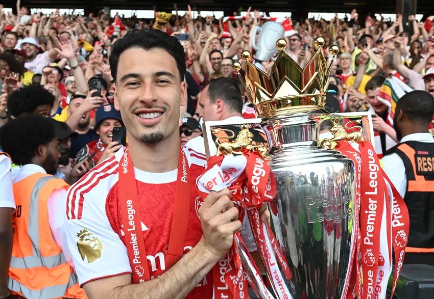 Gabriel Martinelli with the Premier League trophy